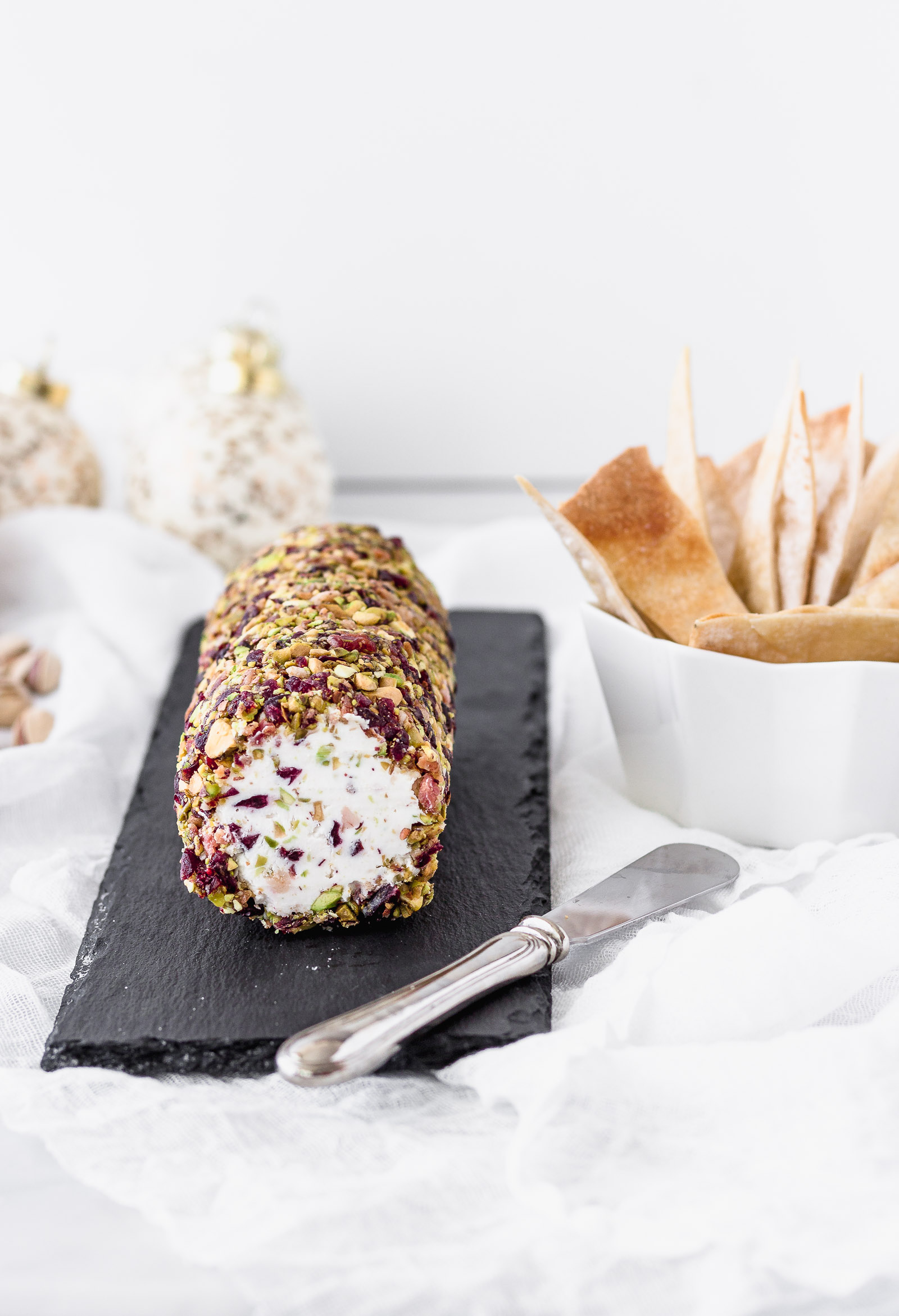 Cheese Log with Cranberries, Pistachios, Bacon and Honey